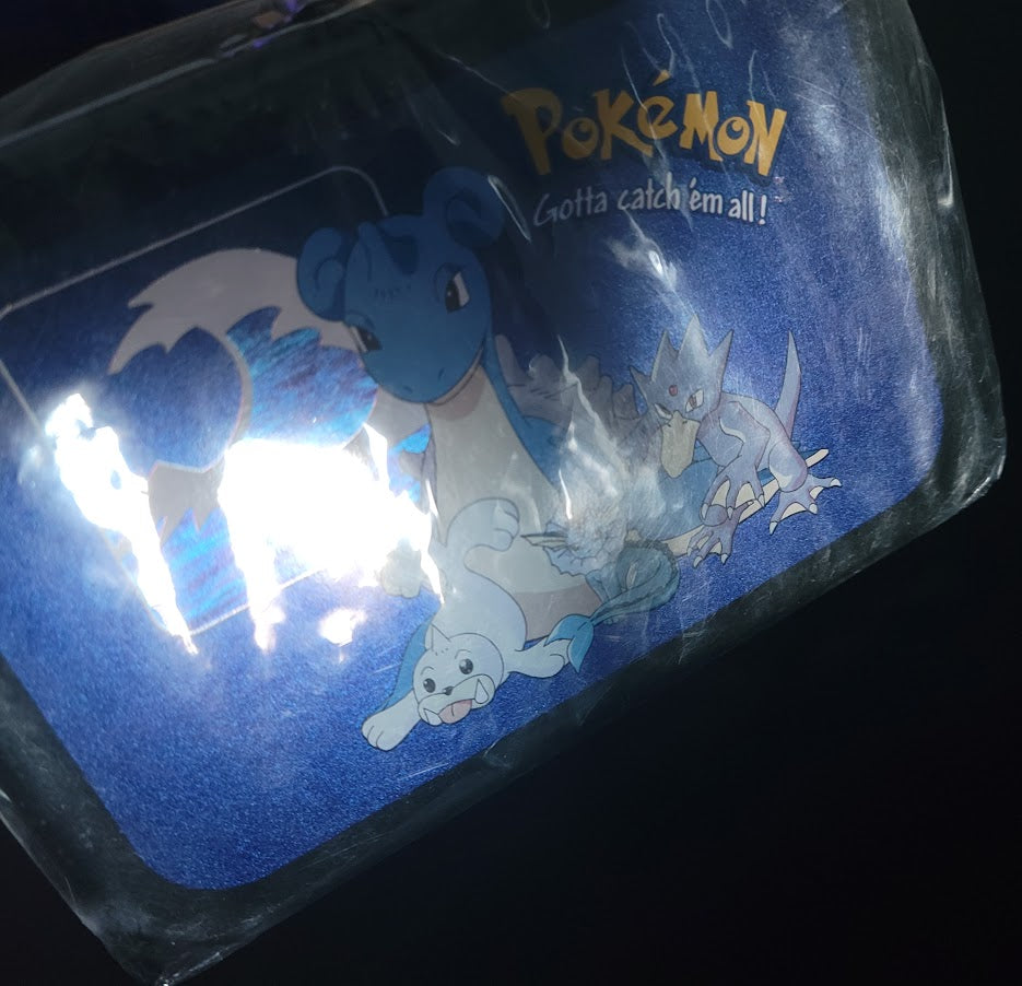 Pokémon Nintendo tin metal storage box water Lapras, Golduck, Seel, Vaporeon art FACTORY SEALED FROM 2000